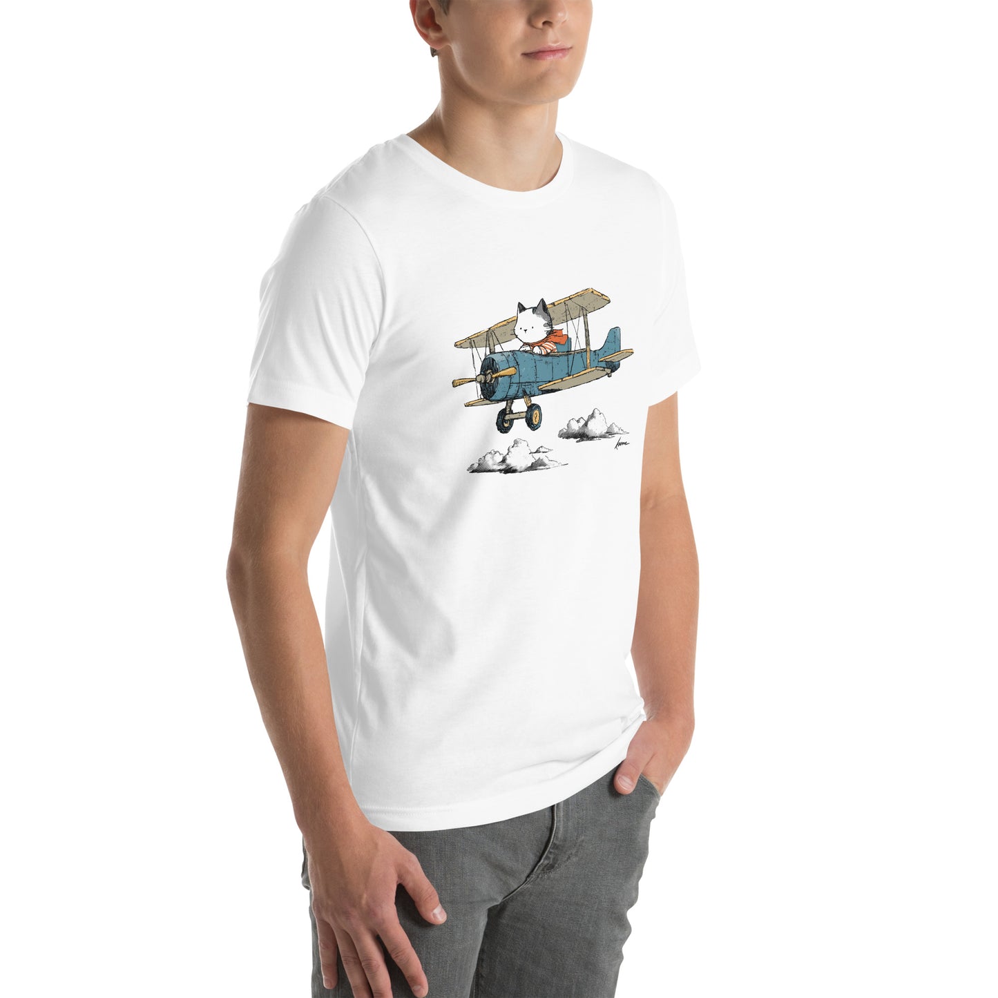 Right front view of white t-shirt showing cat flying red biplane with scarf and blue sky background