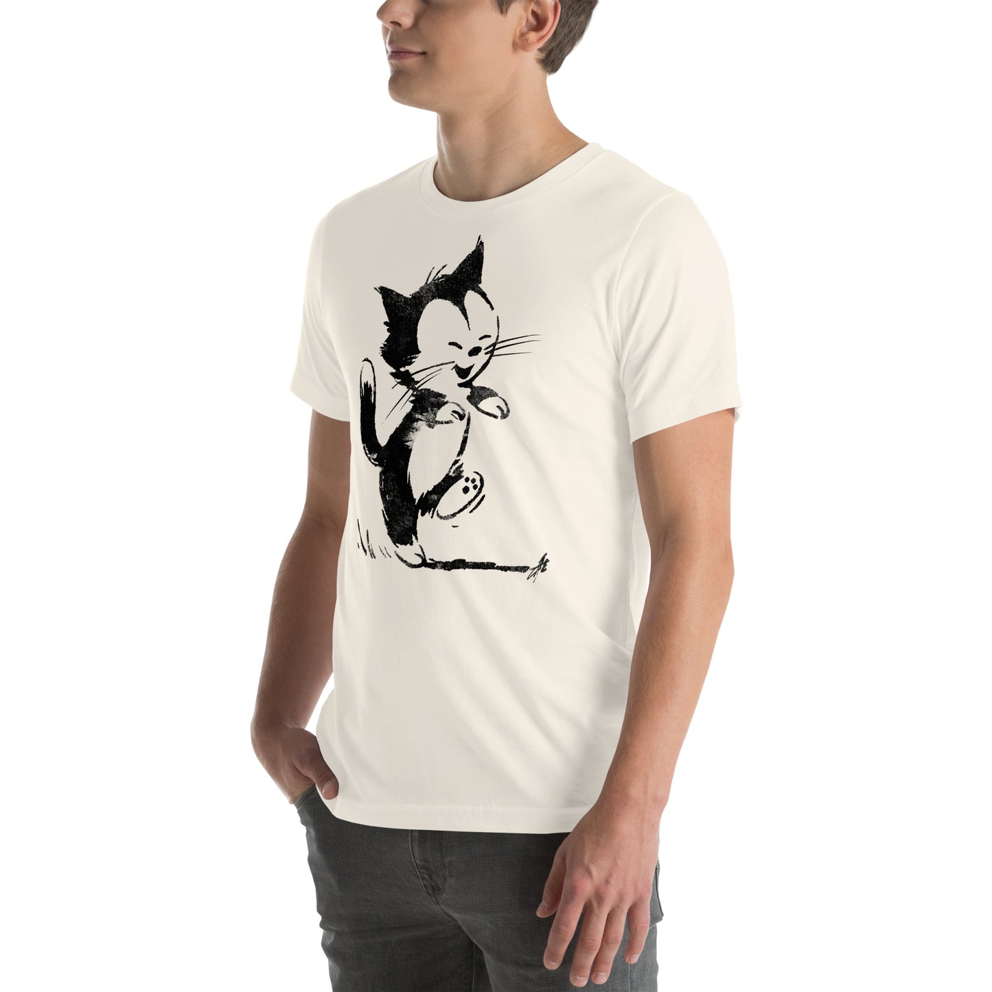 Left front view of vintage white t-shirt with joyful cartoon kitty dancing with paw up and eyes shut