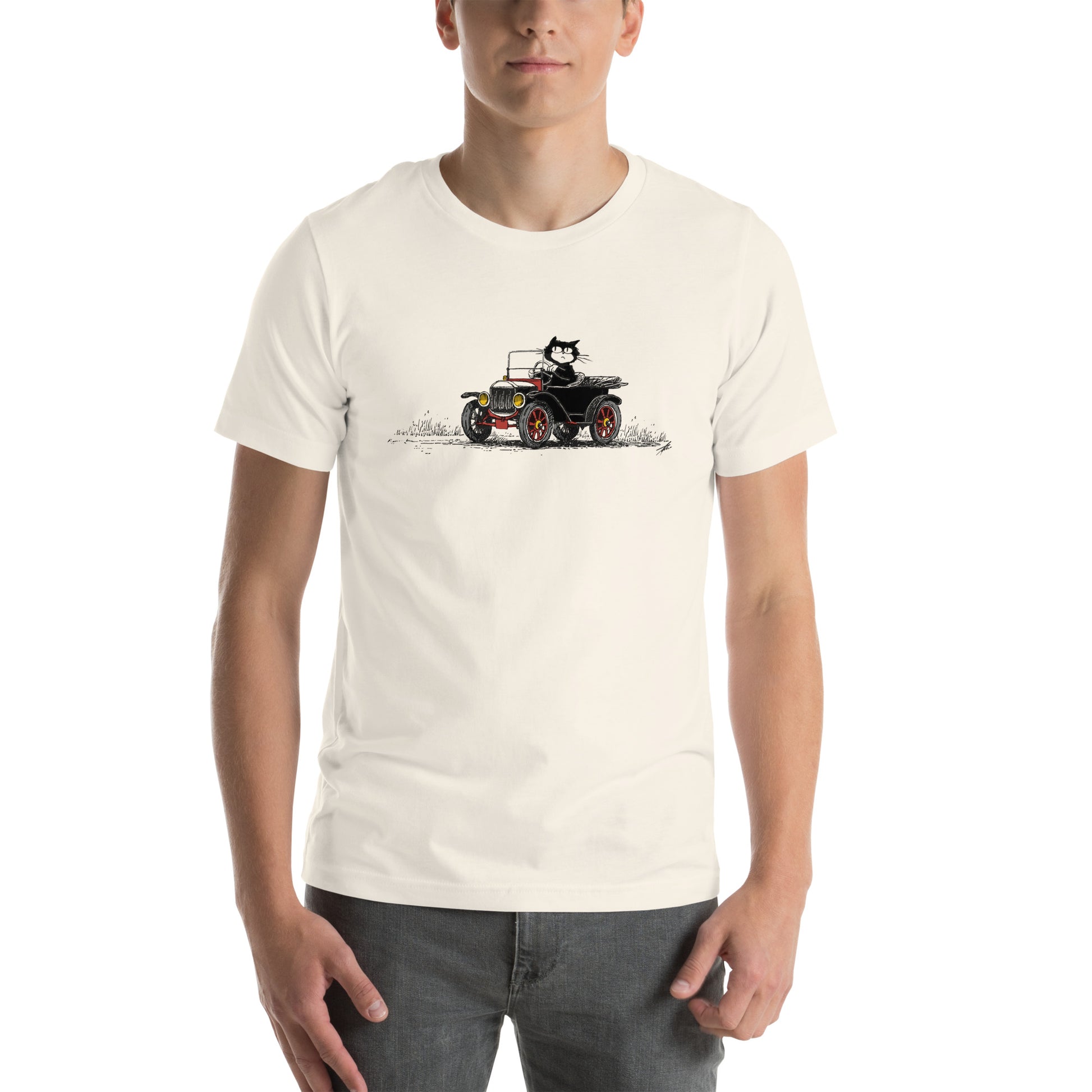 Front view of vintage white t-shirt with long, wide-format cartoon cat driving antique car illustration